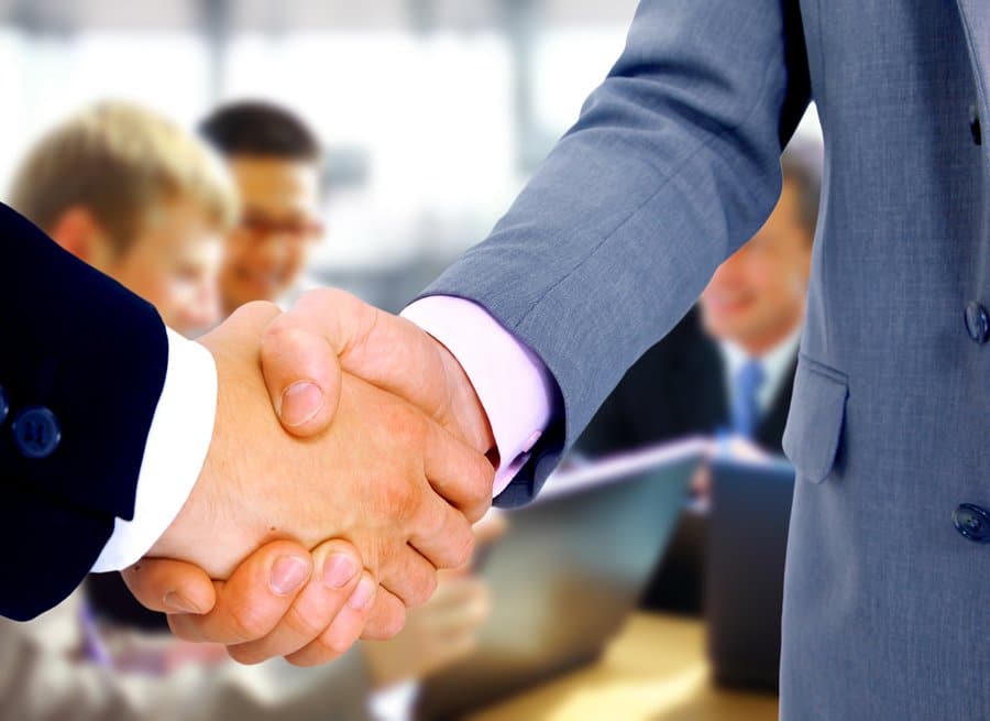 Handshake between lawyer and client