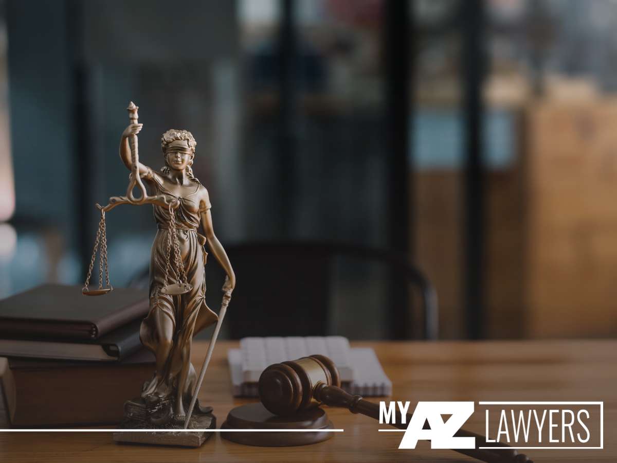 Statue of Lady Justice, gavel, and law books, representing new 2024 Arizona family law deadlines