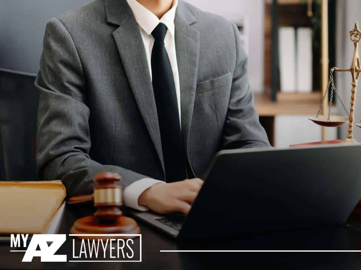 Arizona DUI lawyers providing legal support with a gavel and laptop