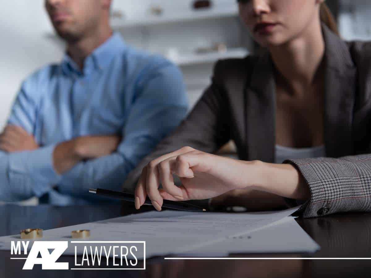 Divorce in Arizona: Couple discussing divorce papers and property division